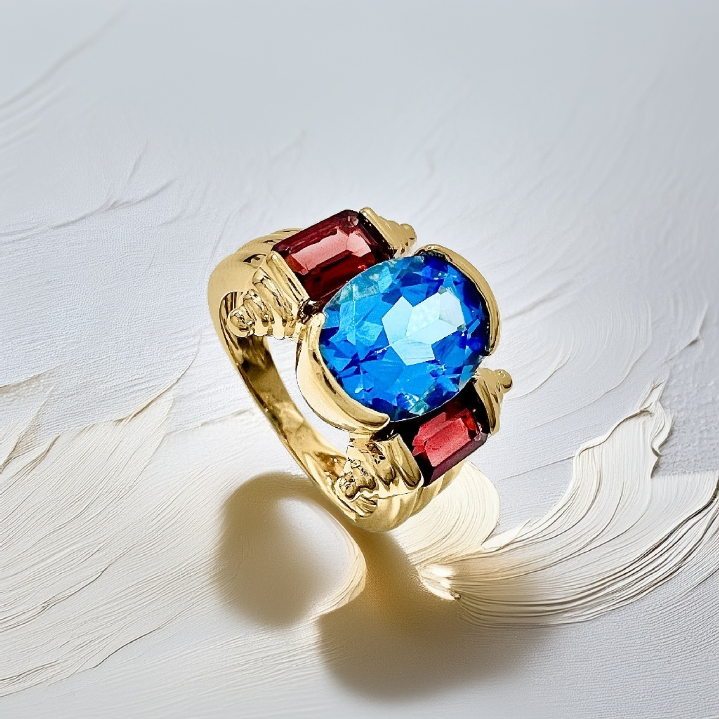 Oval Blue Topaz Garnet Ring