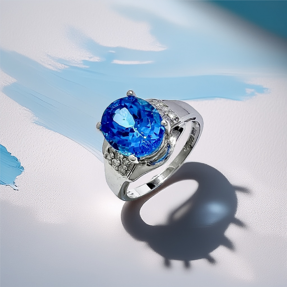 Oval-Shape Blue Topaz Diamond Ring